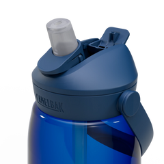 Blue water bottle with a straw lid on a white background