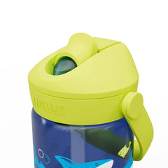 A blue Camelbak kids water bottle with a green flip straw lid and a handle, decorated with shark and ray illustrations.